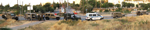 Line-up of military vehicles